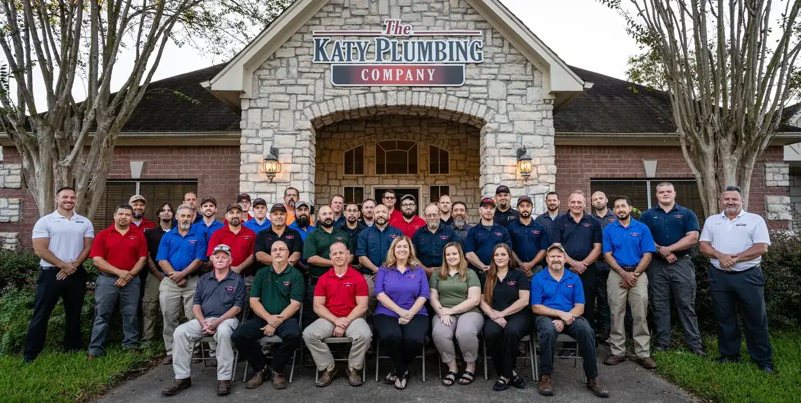 The Katy Plumbing Company team outside their Katy, TX office